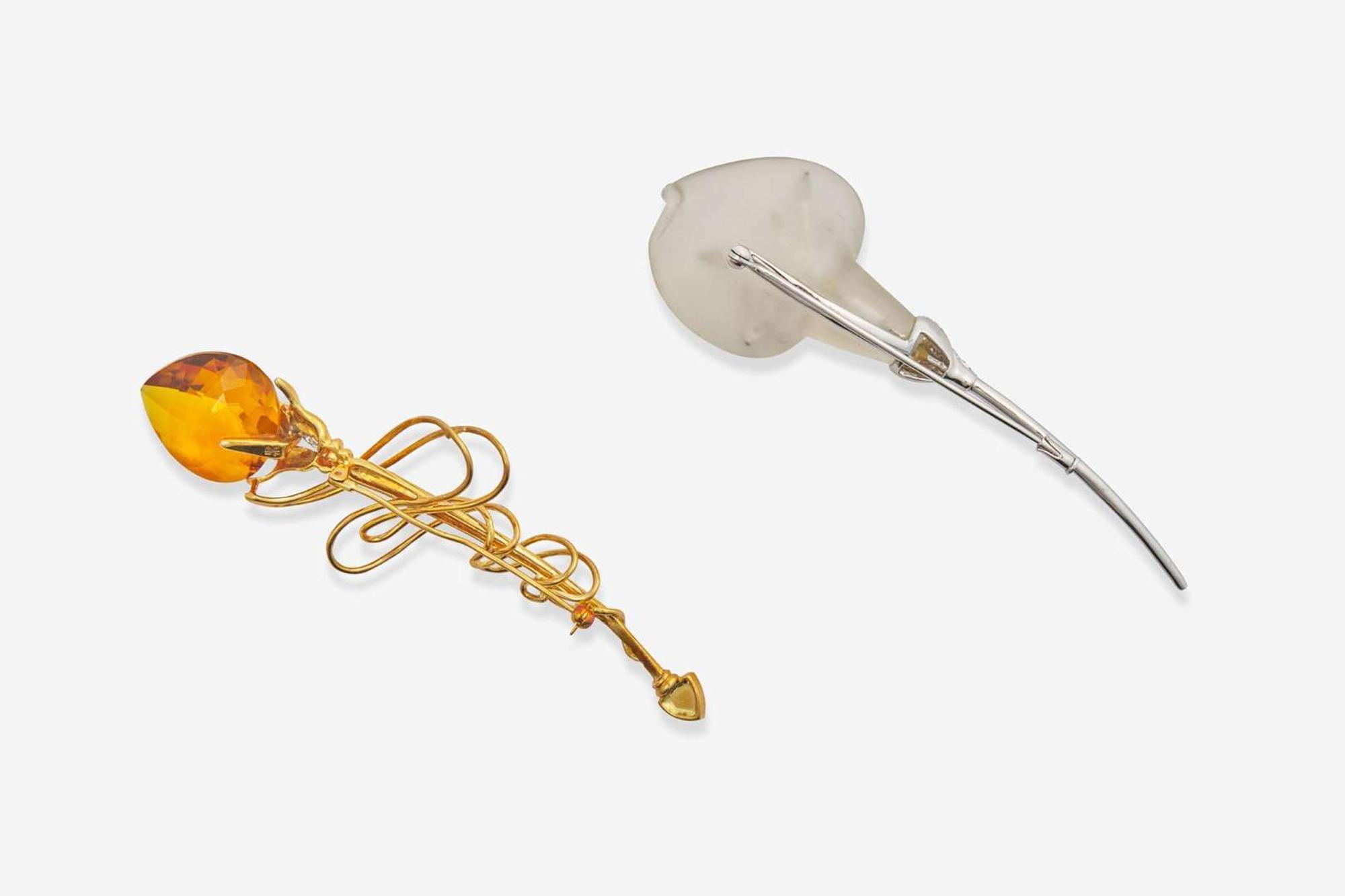 A Pair of Gold and Gemstone Lapel Pins