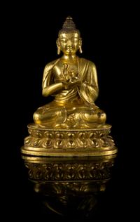A Gilt Bronze Figure of Buddha Height 6 1/4 inches.