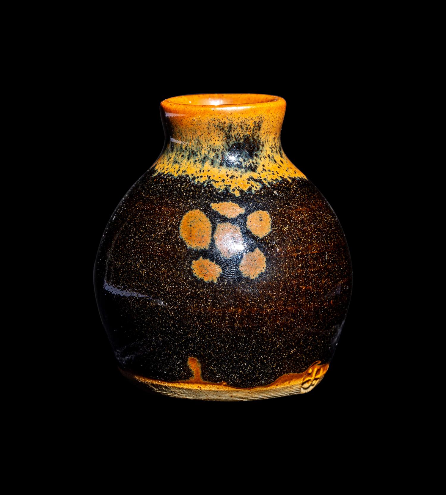 A Small Dark Brown Glazed Stoneware Jar