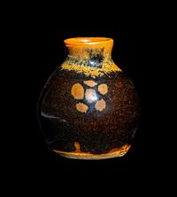 A Small Dark Brown Glazed Stoneware Jar