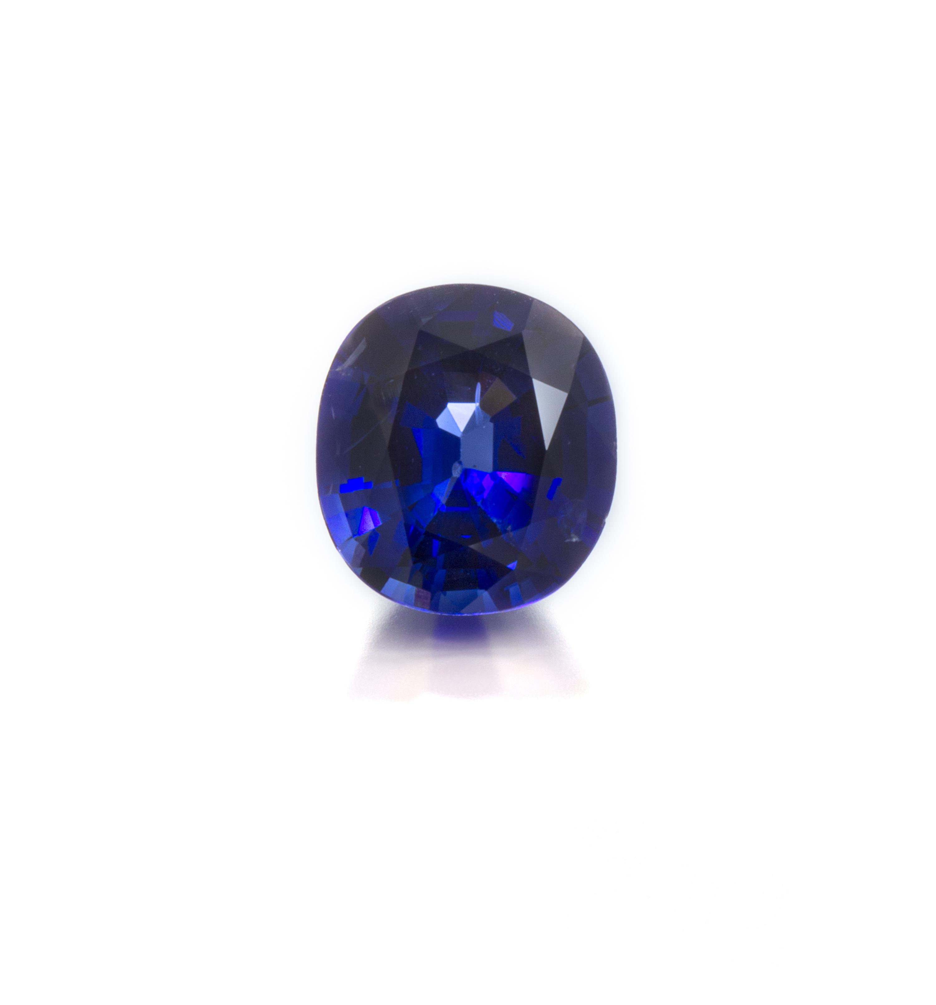 A 6.14 Carat Antique Cushion Cut Sapphire,