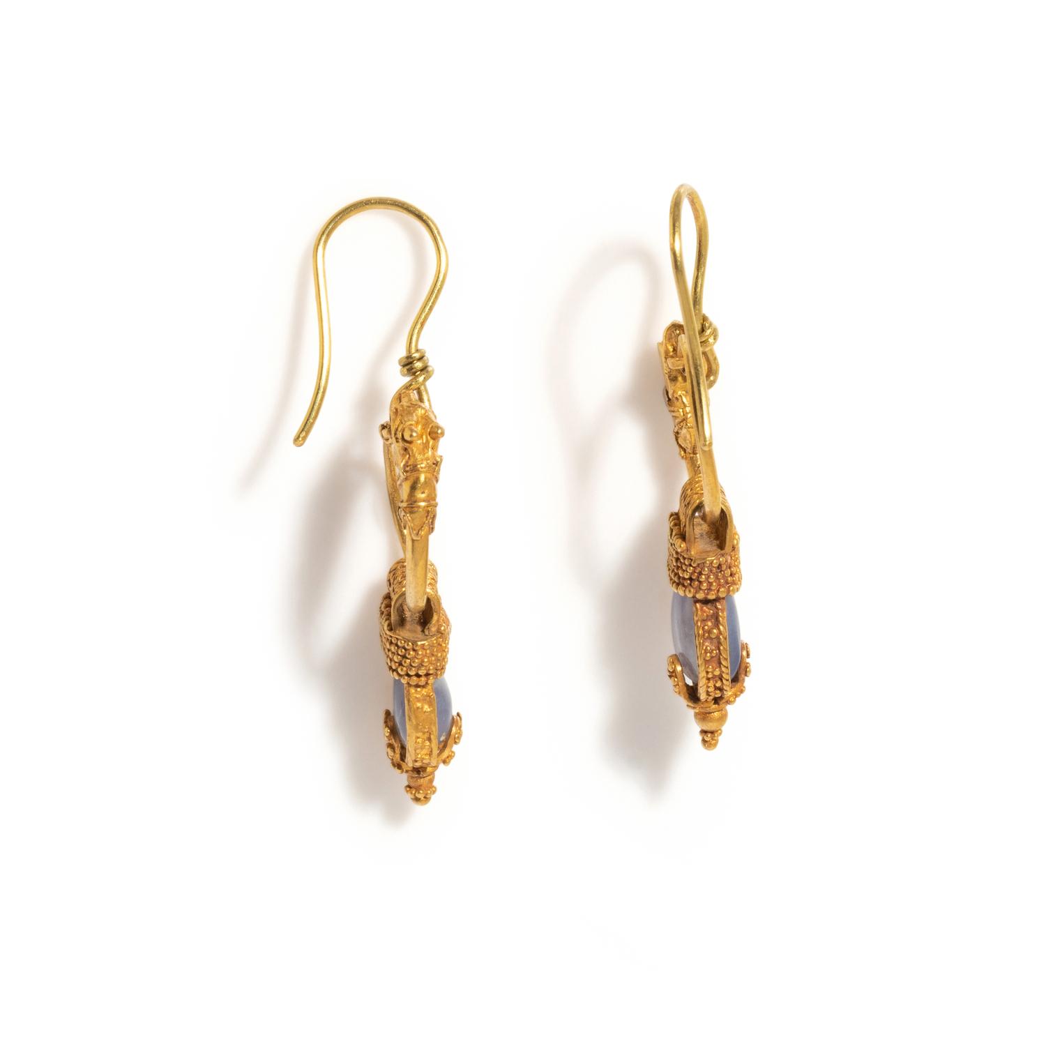 A Pair of Greek Gold and Chalcedony Earrings with Goat Heads