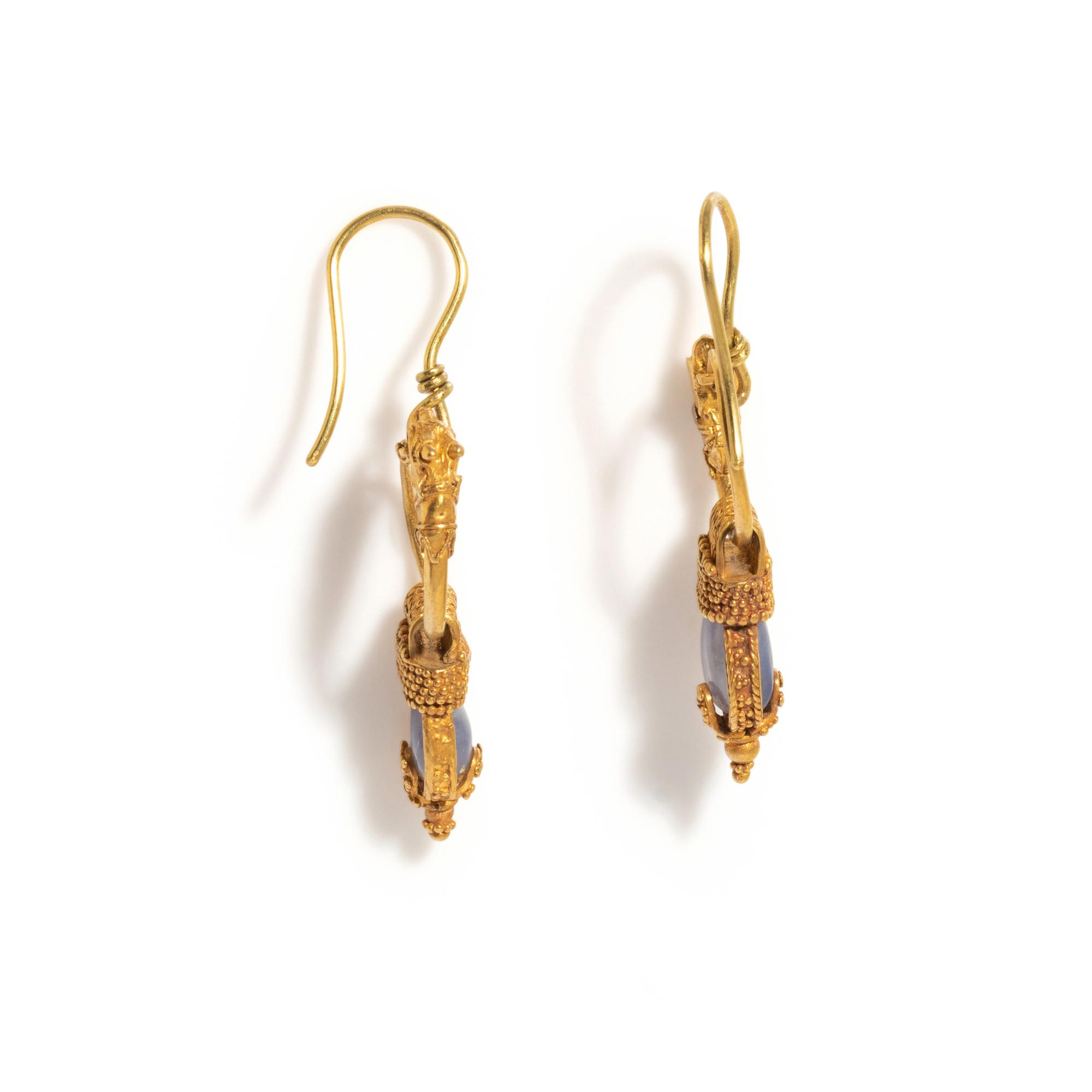 A Pair of Greek Gold and Chalcedony Earrings with Goat Heads