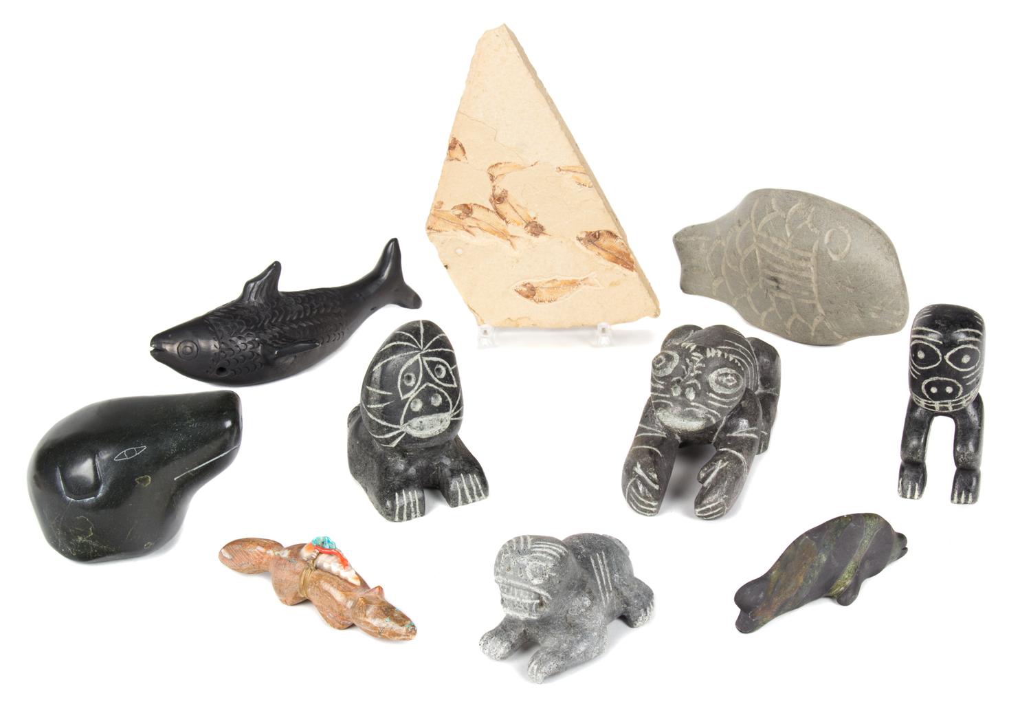 A Group of Nine Stone Carvings Length of largest 7 inches.