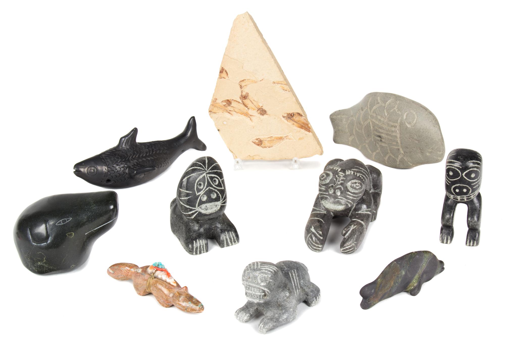 A Group of Nine Stone Carvings Length of largest 7 inches.
