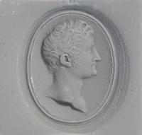 A Victorian Gold and Glass Pendant with a Male Portrait Bust