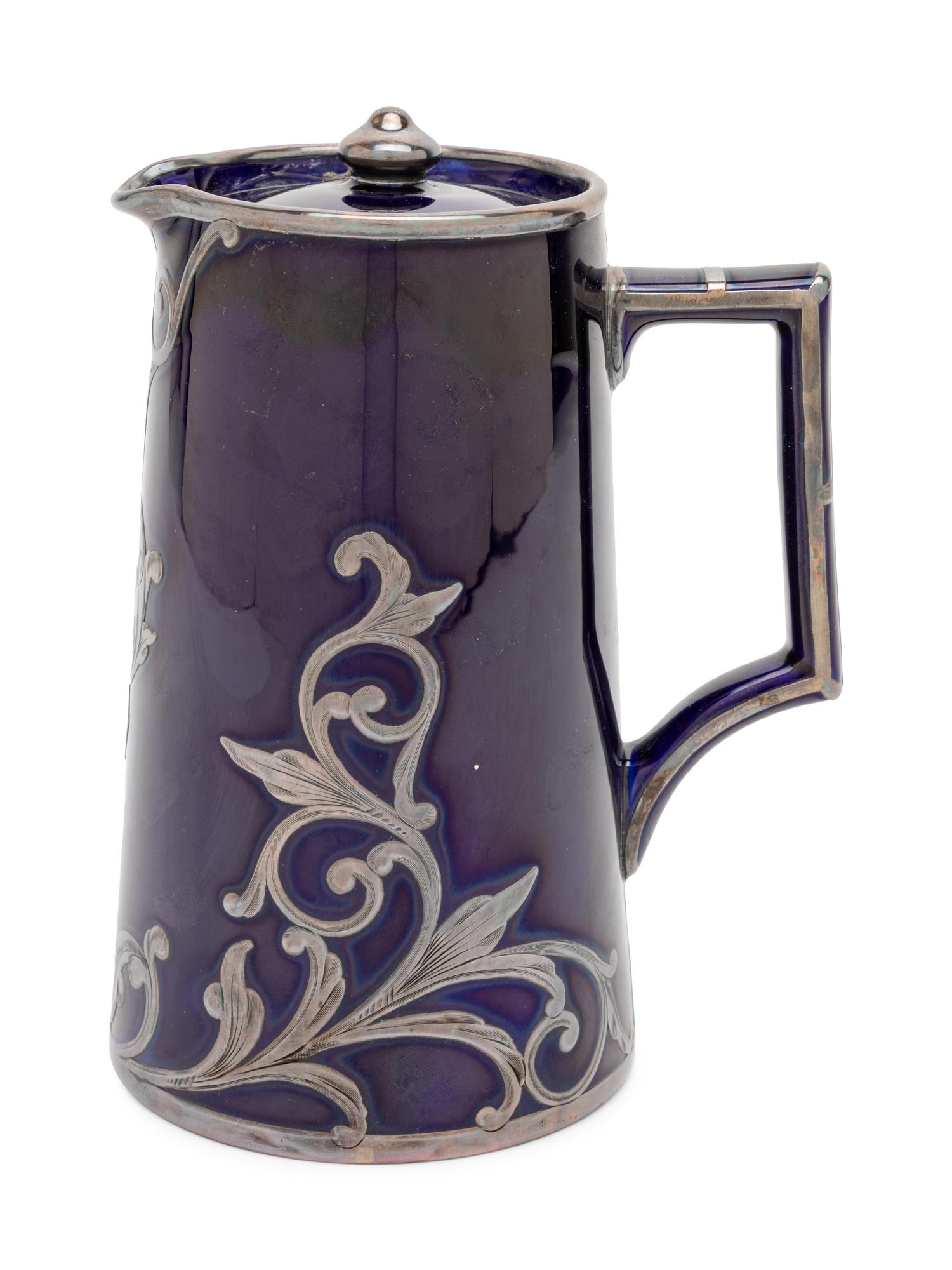 A Silver Overlay Lenox Porcelain Pitcher