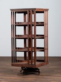 A Country Store Iron-Mounted Oak Rotating Bookshelf