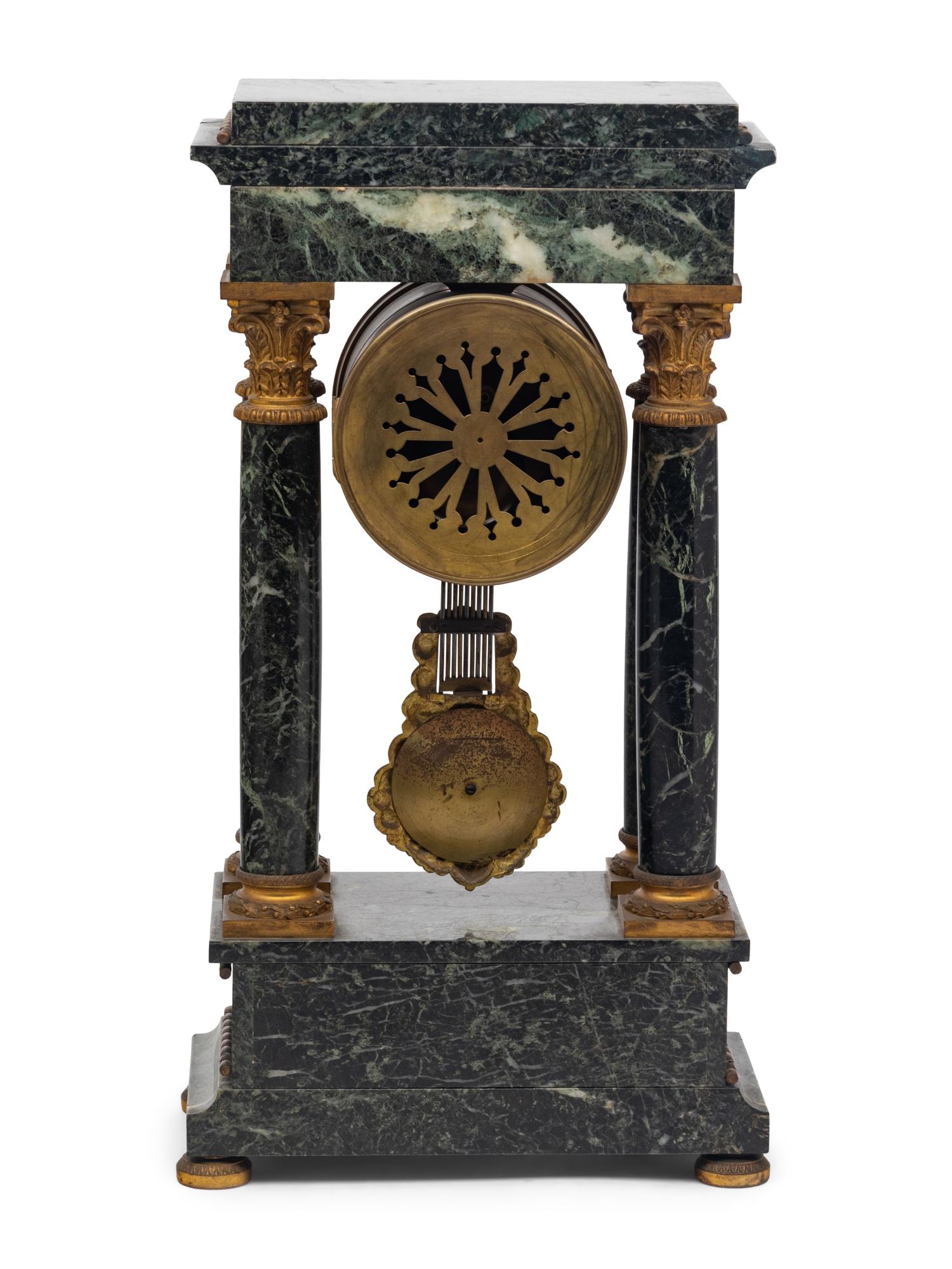 An Empire Style Gilt Bronze Mounted Marble Portico Clock