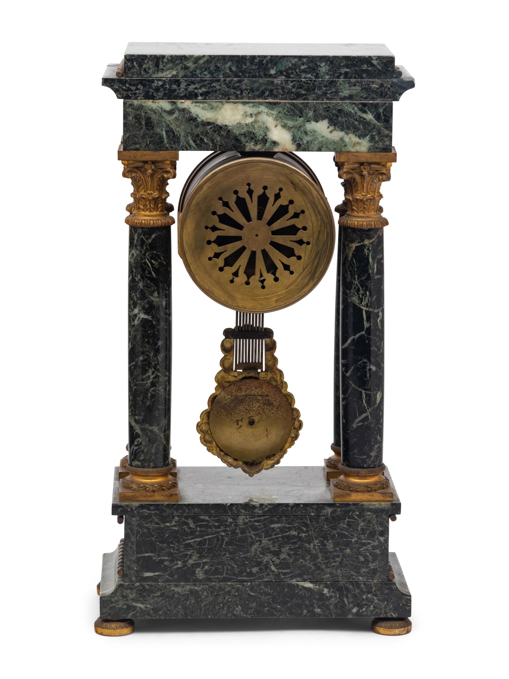 An Empire Style Gilt Bronze Mounted Marble Portico Clock