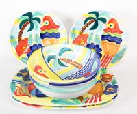Seven Painted Ceramic Serving Dishes Length of largest 24 1/4 inches.