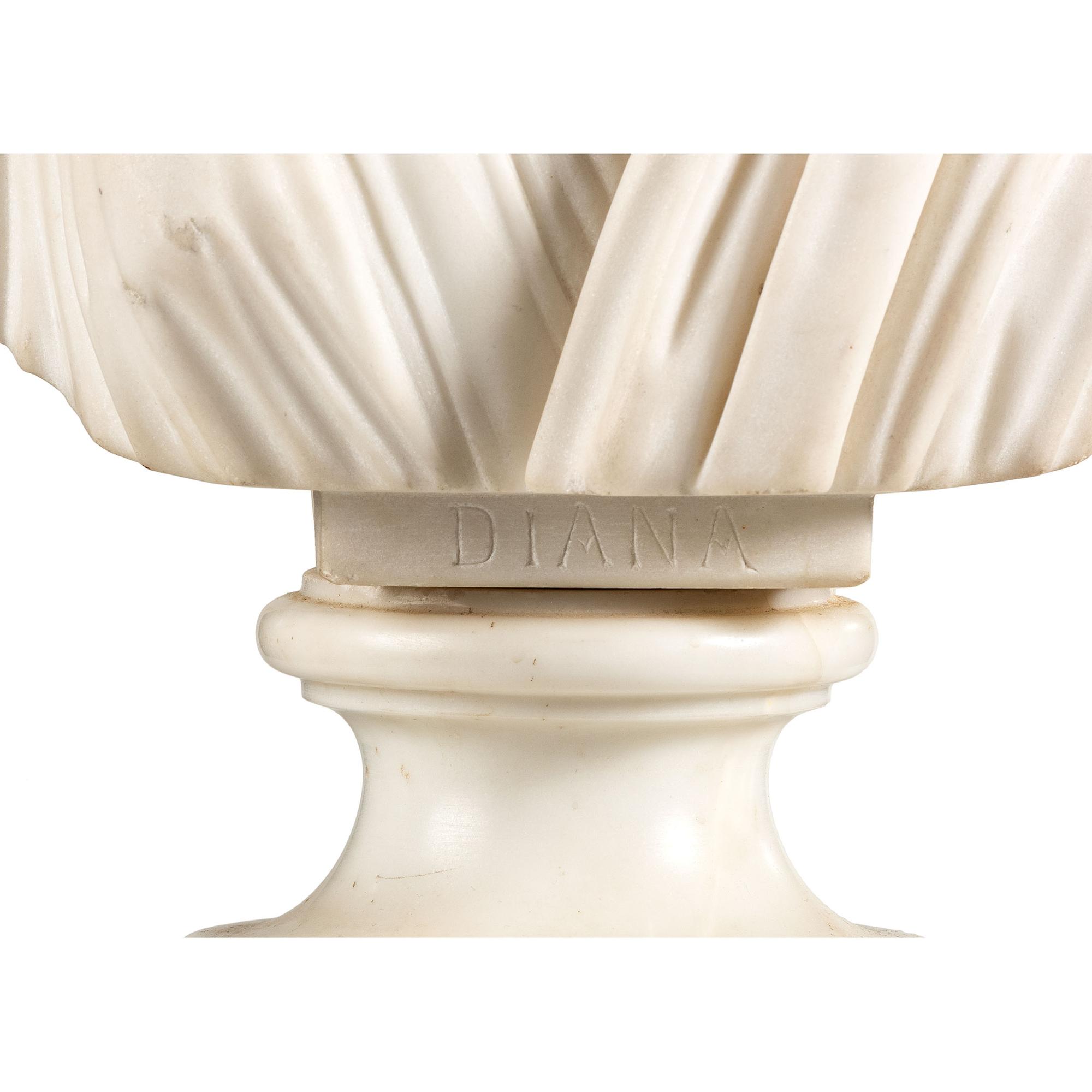 A Continental White Marble Bust of Diana the Huntress