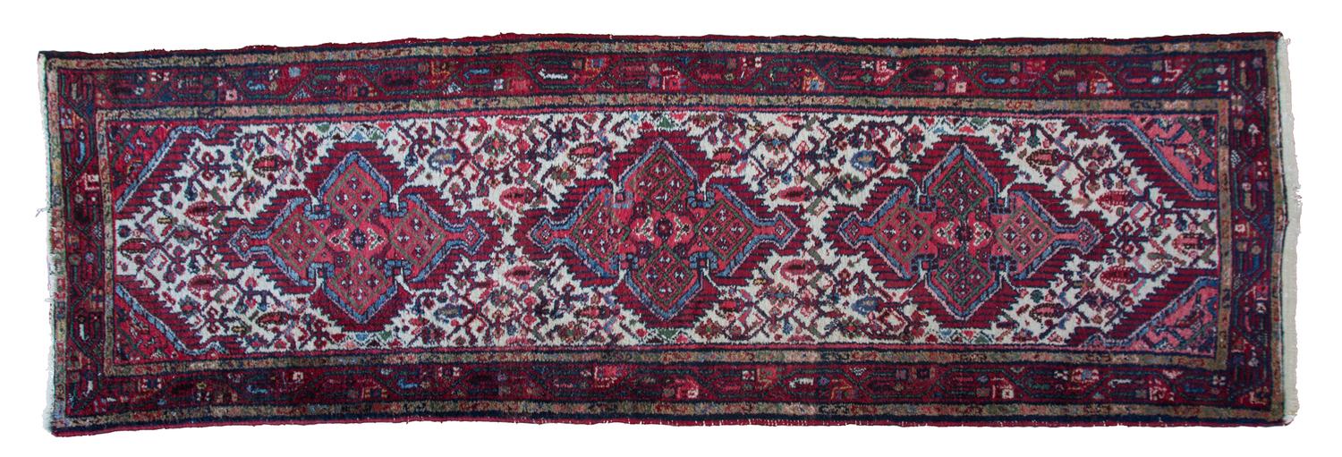 A Heriz Wool Runner 8 feet 8 inches x 2 feet 9 inches. — MID 20TH CENTURY