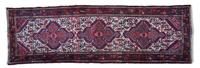 A Heriz Wool Runner 8 feet 8 inches x 2 feet 9 inches. — MID 20TH CENTURY