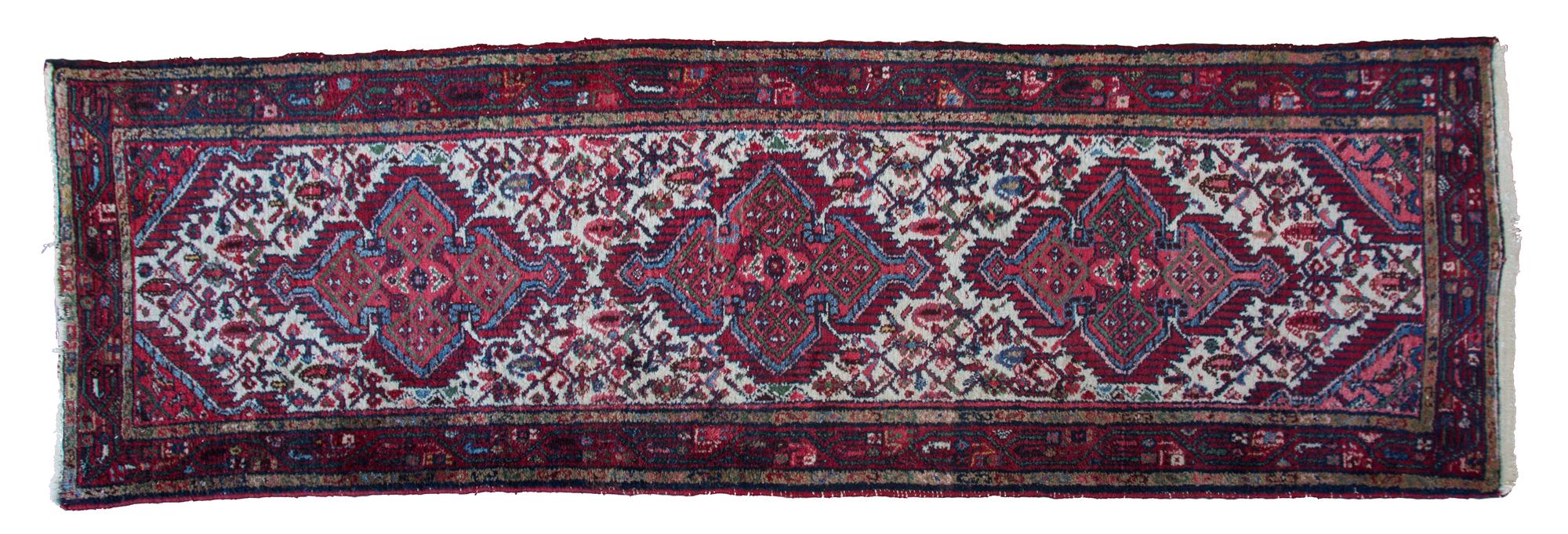 A Heriz Wool Runner 8 feet 8 inches x 2 feet 9 inches. — MID 20TH CENTURY
