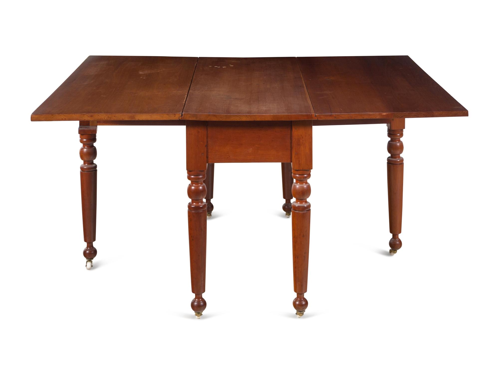 A Late Federal Cherrywood Drop-Leaf Dining Table (Please send consignor donation receipt once donated)