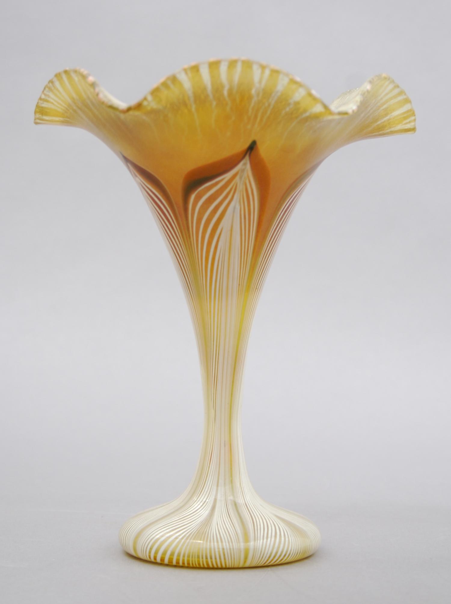 A Quezal Glass Vase, Height 6 1/2 inches.