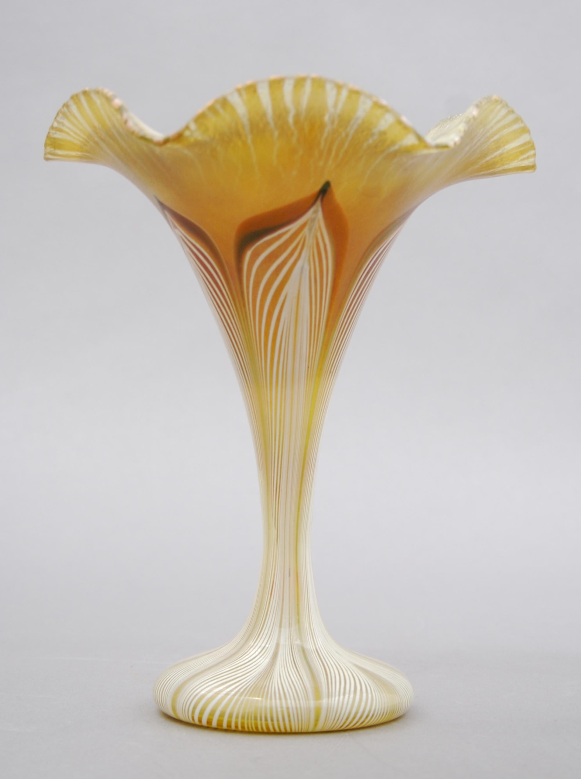 A Quezal Glass Vase, Height 6 1/2 inches.