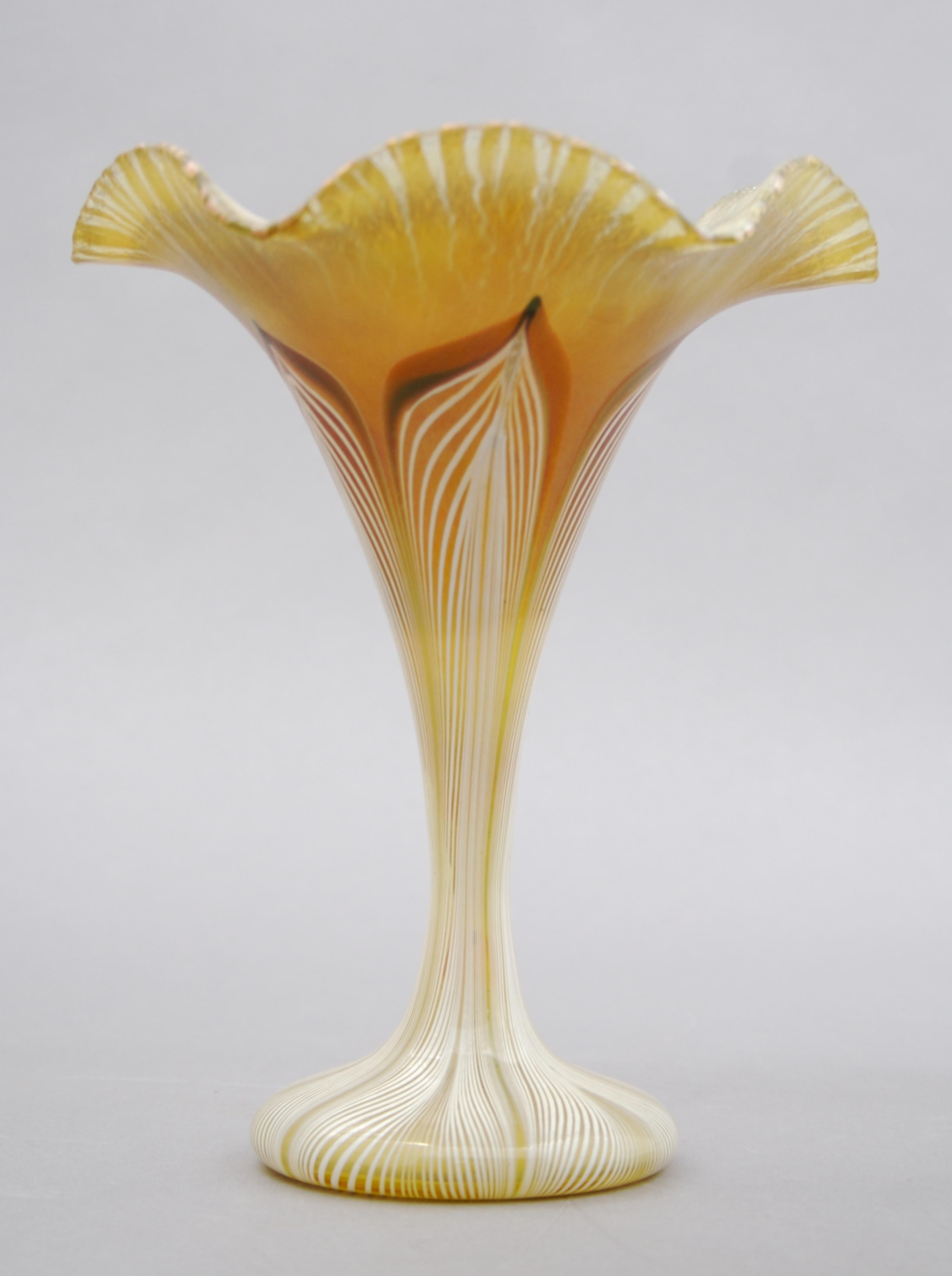 A Quezal Glass Vase, Height 6 1/2 inches.