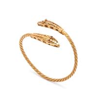 YELLOW GOLD AND GARNET SNAKE CUFF BRACELET