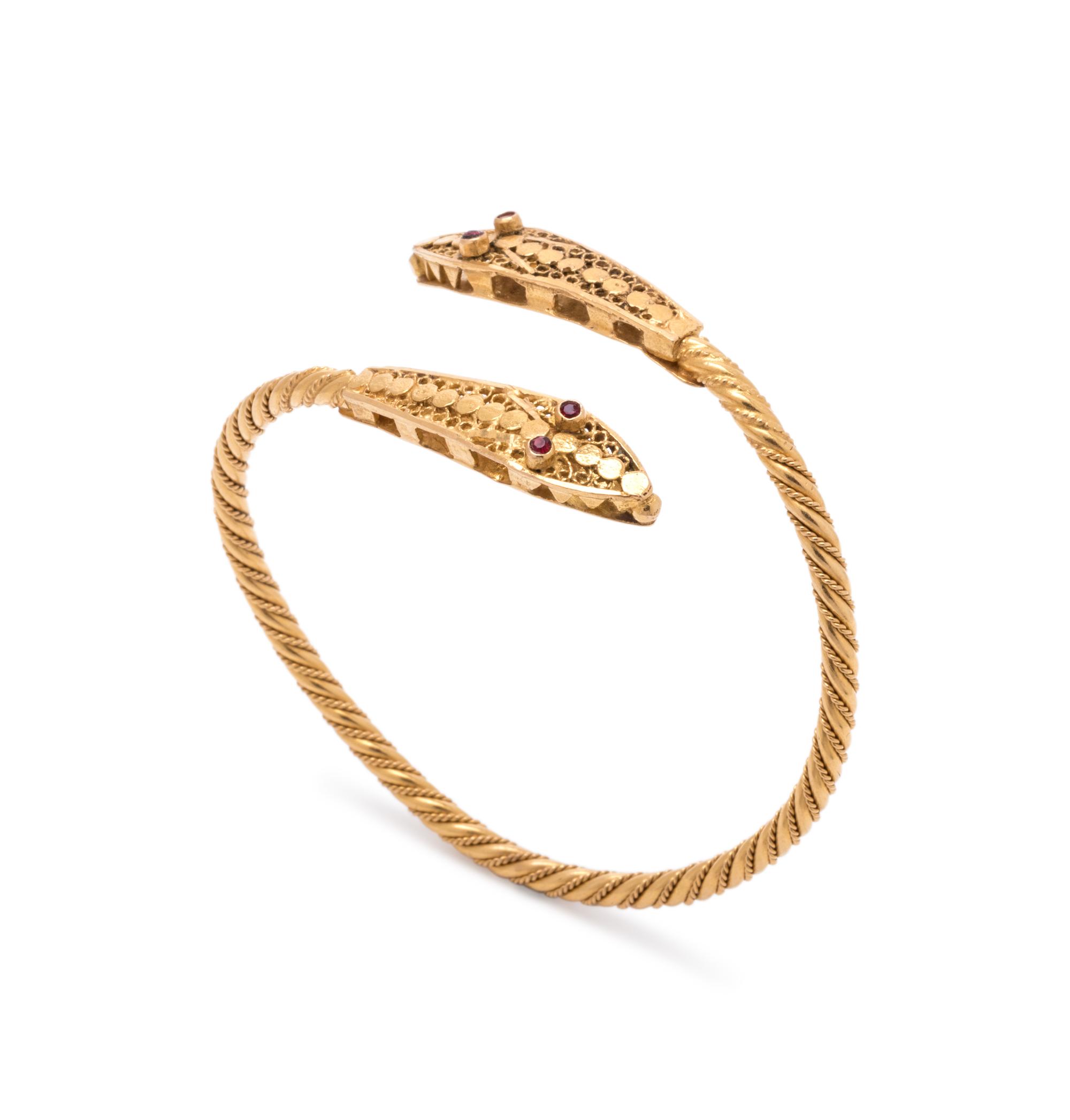 YELLOW GOLD AND GARNET SNAKE CUFF BRACELET