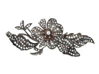 VICTORIAN, SILVER-TOPPED GOLD AND DIAMOND 'EN TREMBLANT' CORSAGE BROOCH