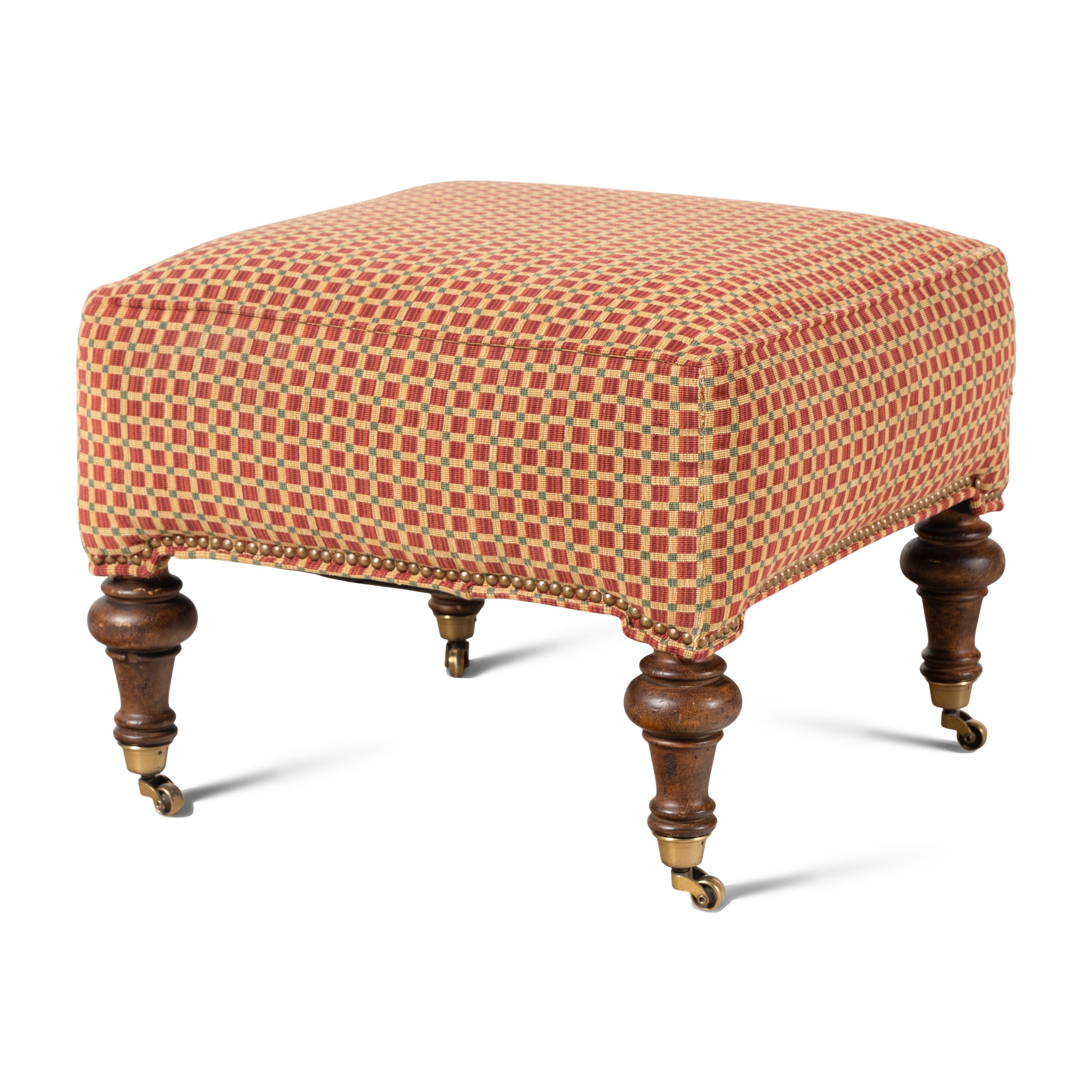 An English Button-Tufted Leather Wingback Chair and Associated Ottoman