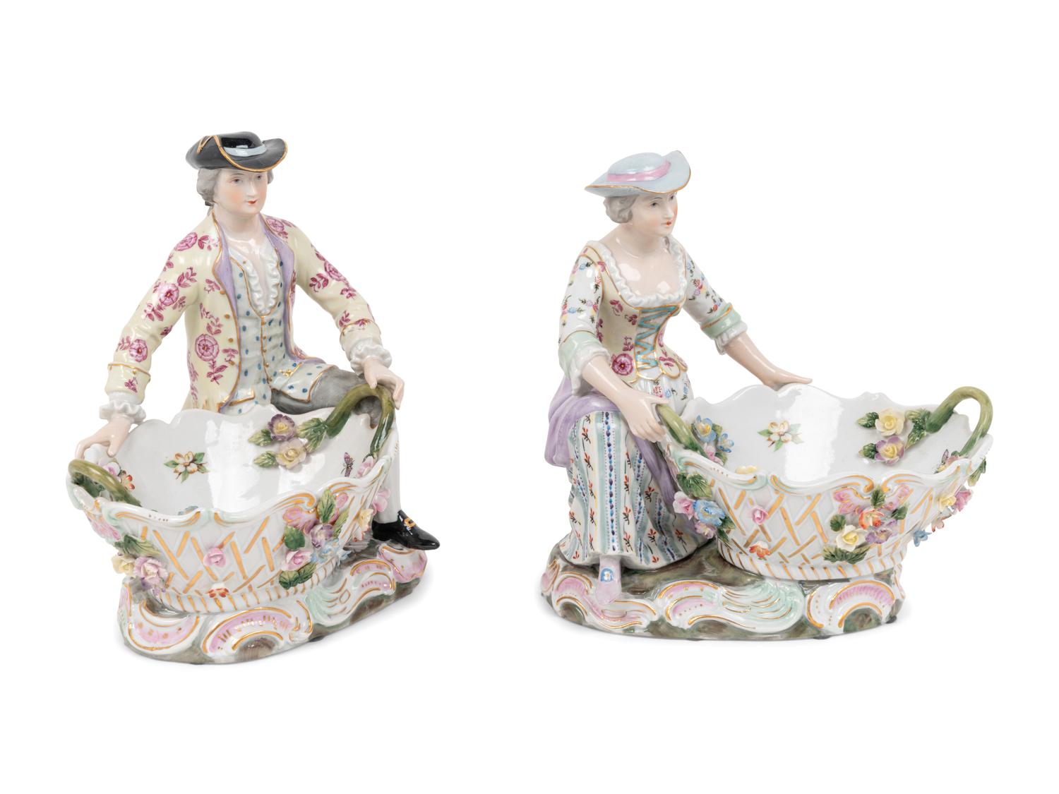 A Pair of Dresden Porcelain Figural Sweetmeat Dishes