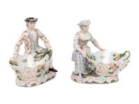 A Pair of Dresden Porcelain Figural Sweetmeat Dishes