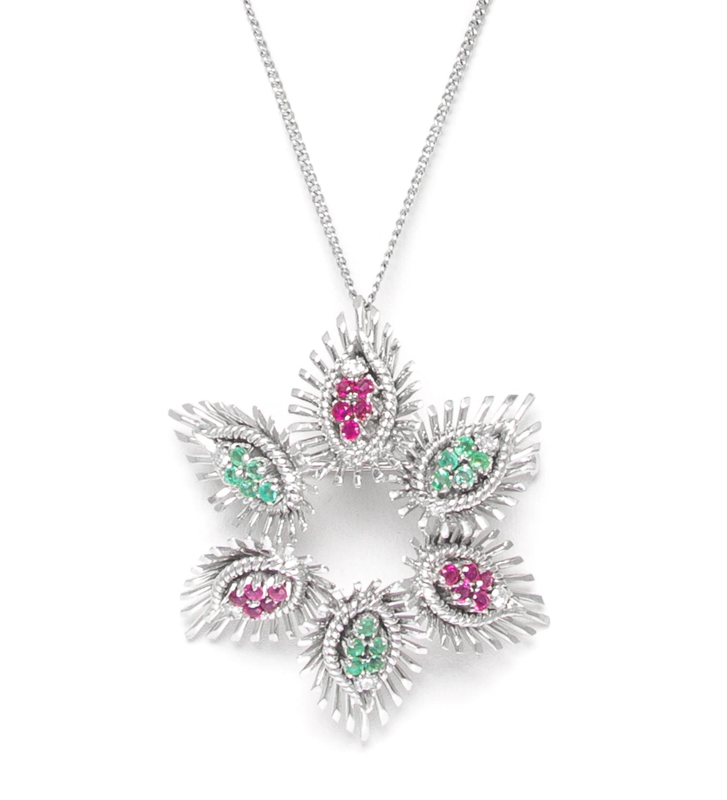 An 18 Karat White Gold, Diamond, Emerald and Ruby Pendant/Brooch, 8.90 dwts.