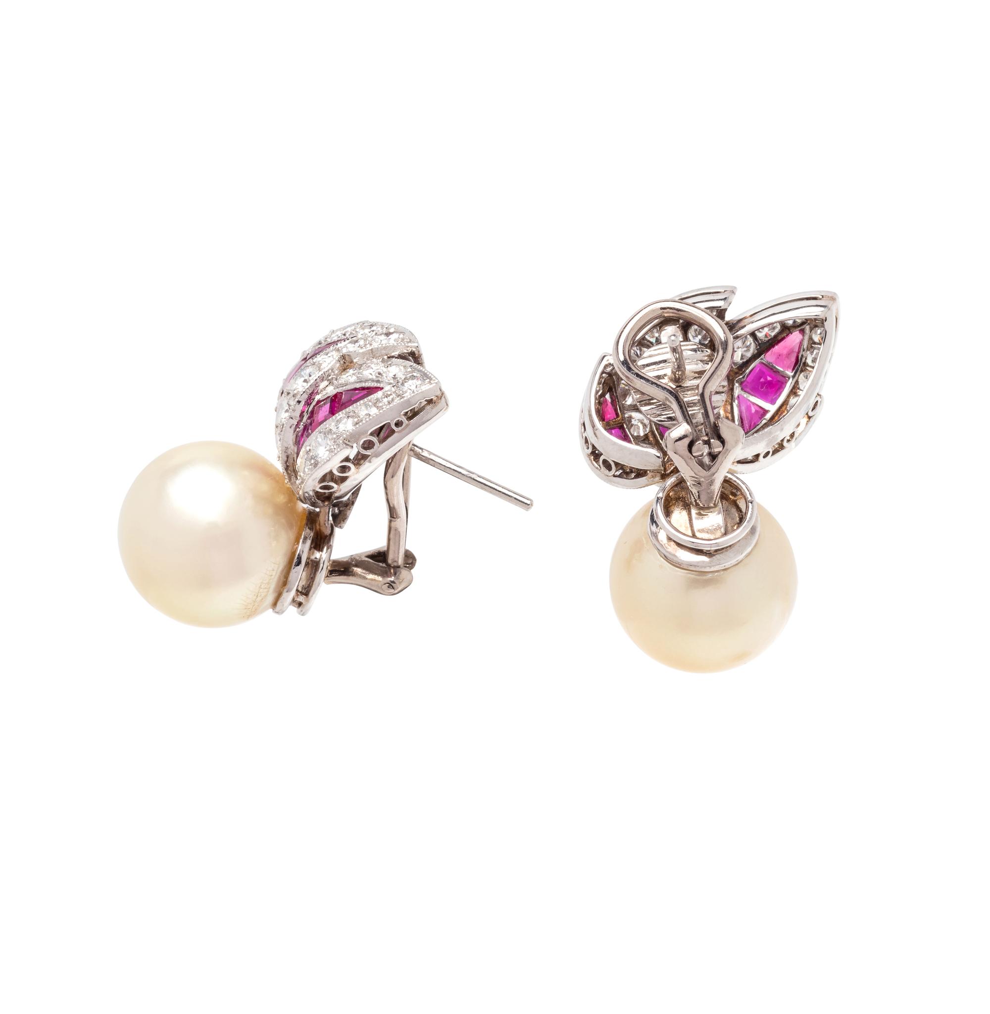 EVELYN CLOTHIER, DIAMOND, RUBY AND CULTURED SOUTH SEA PEARL EARCLIPS
