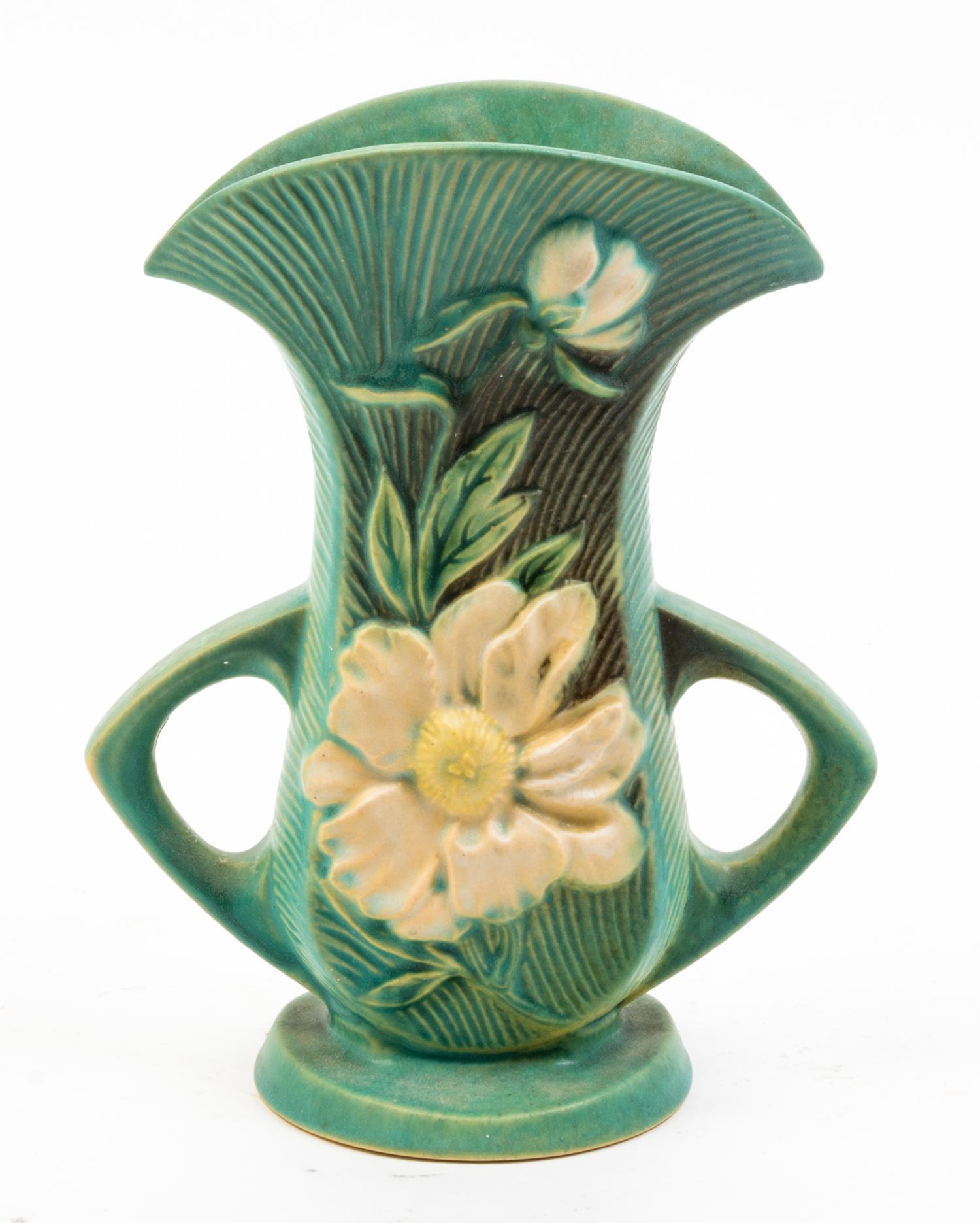 A Roseville Pottery Vase Height 8 3/8 inches.