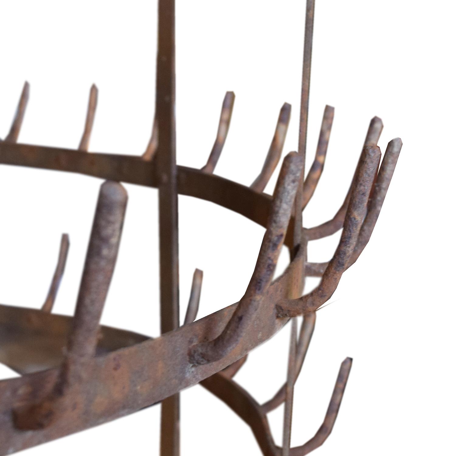 A Wrought Iron Bottle Rack 35" W x 35" D x 73" H — Italy, Circa 1920