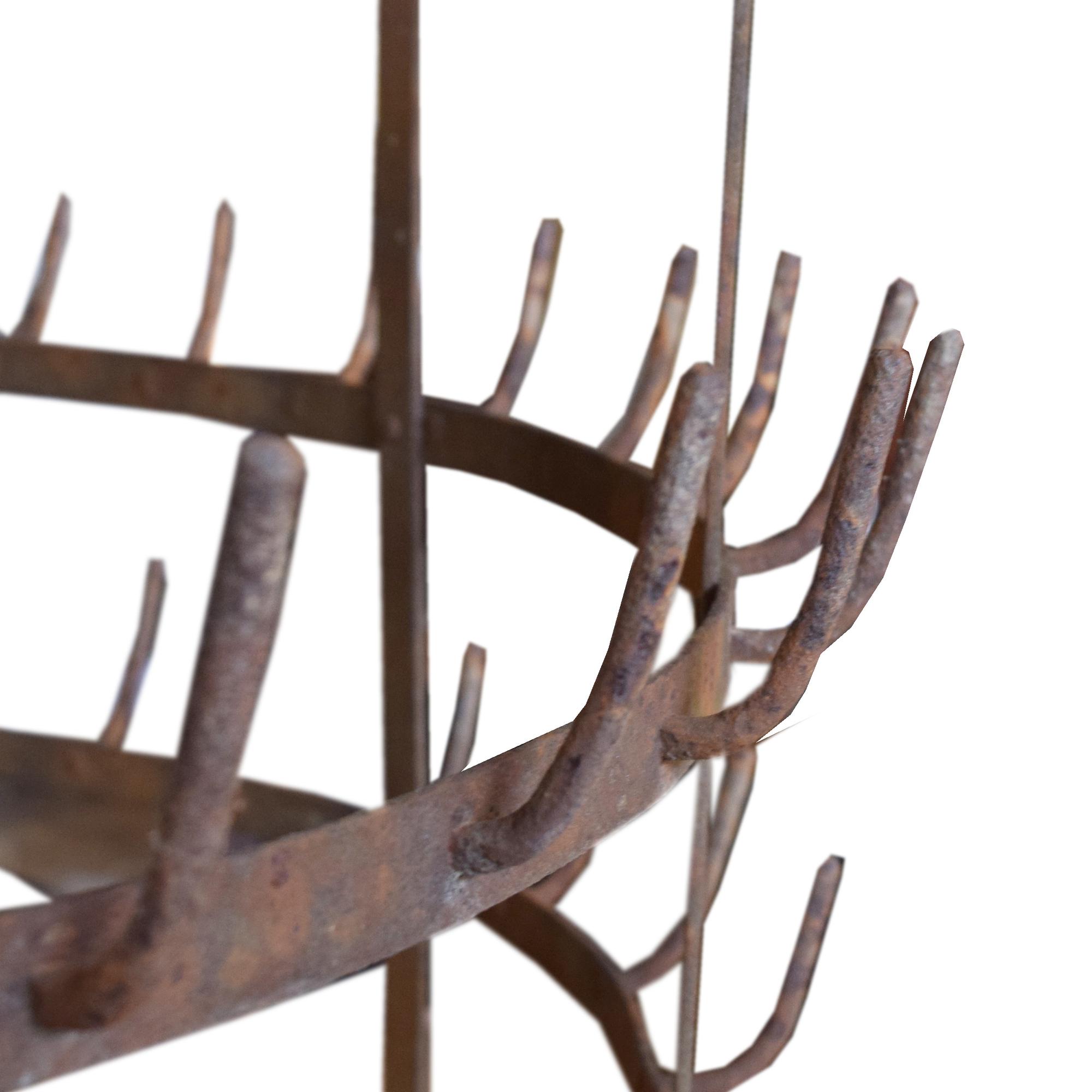 A Wrought Iron Bottle Rack 35" W x 35" D x 73" H — Italy, Circa 1920
