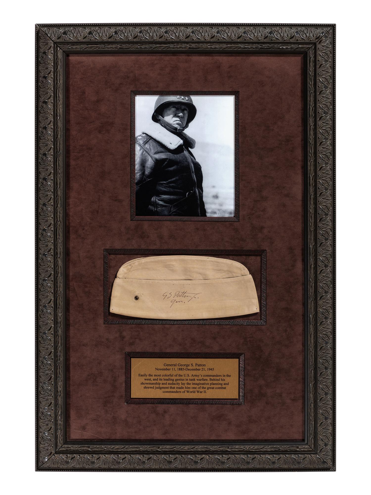 [WORLD WAR II]. PATTON, George S. (1885-1945). Garrison cap signed ("GS Patton Jr. Gen.") in presentation display.