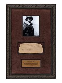 [WORLD WAR II]. PATTON, George S. (1885-1945). Garrison cap signed ("GS Patton Jr. Gen.") in presentation display.