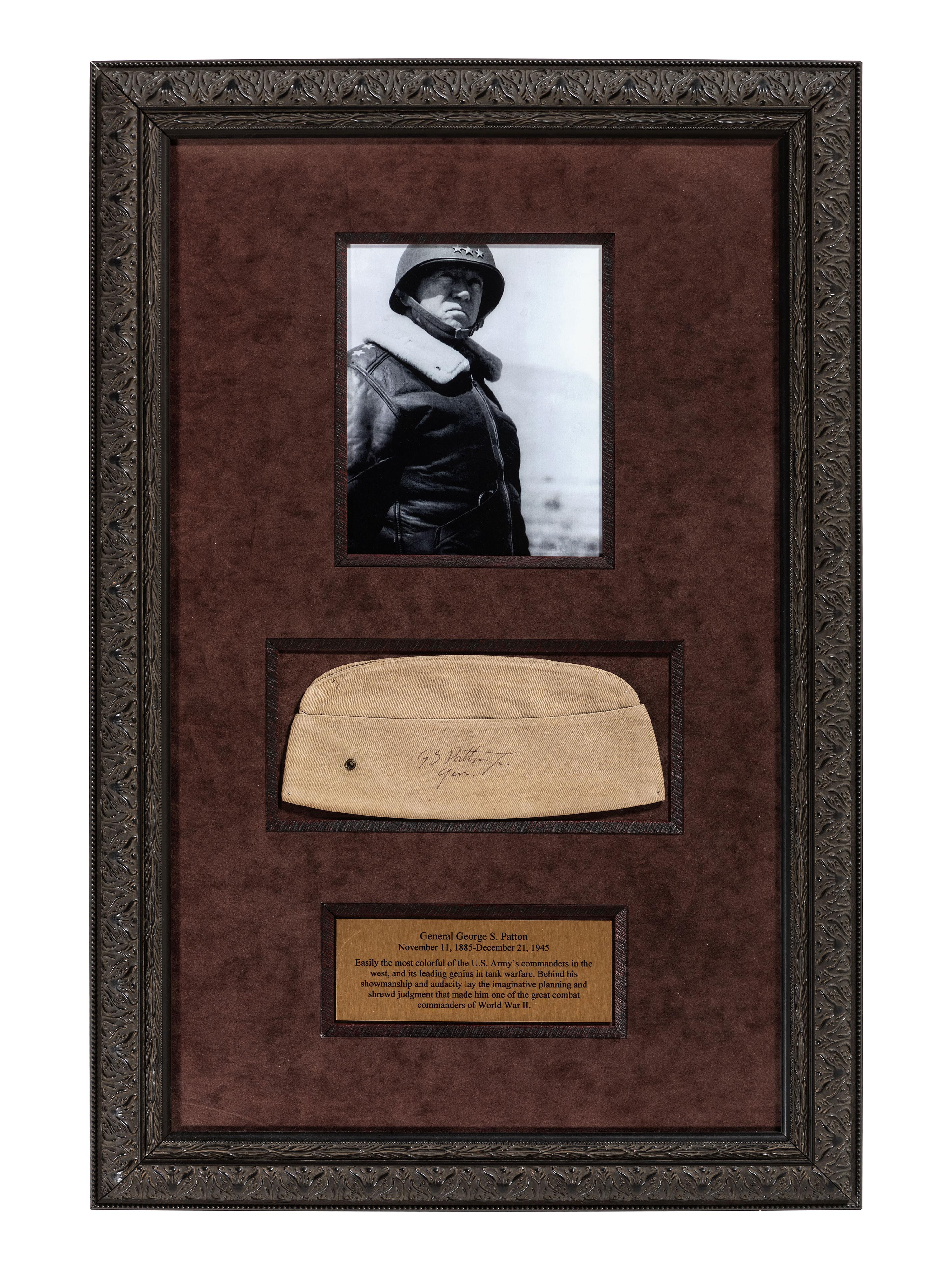 [WORLD WAR II]. PATTON, George S. (1885-1945). Garrison cap signed ("GS Patton Jr. Gen.") in presentation display.