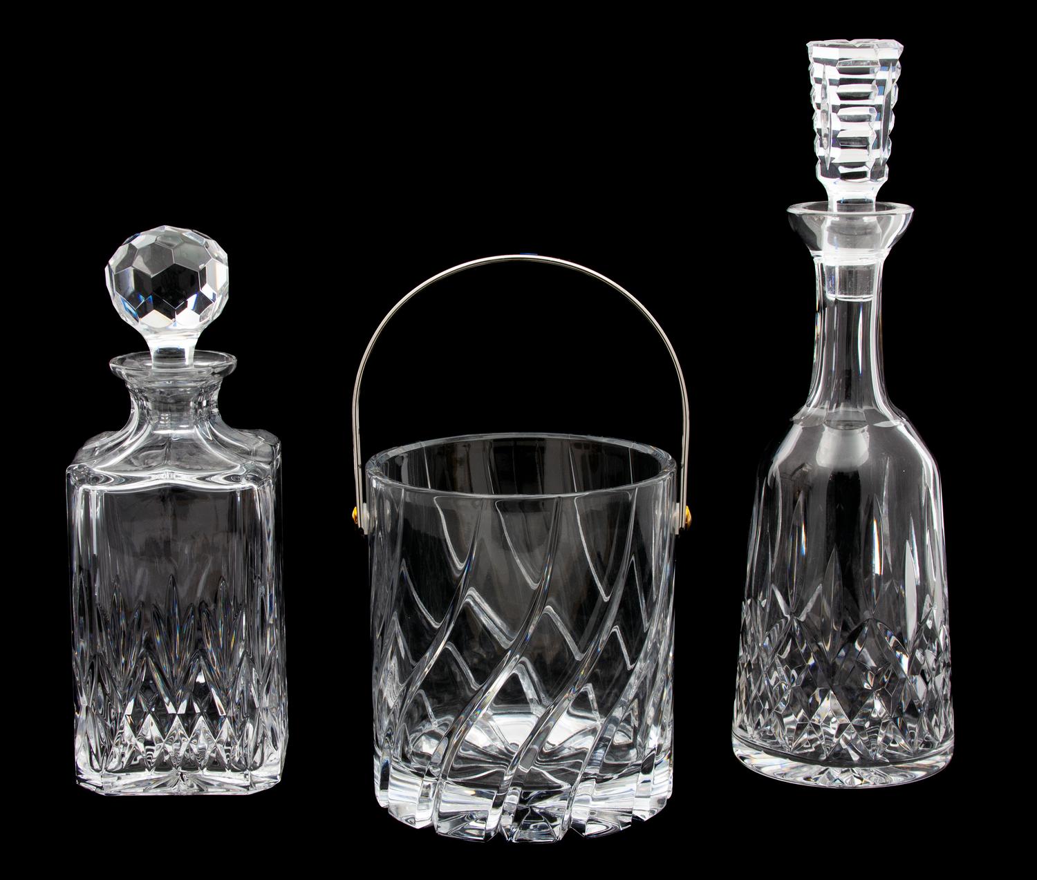 Two Cut Glass Decanters and an Ice Bucket Height of tallest 13 inches. — 20TH CENTURY