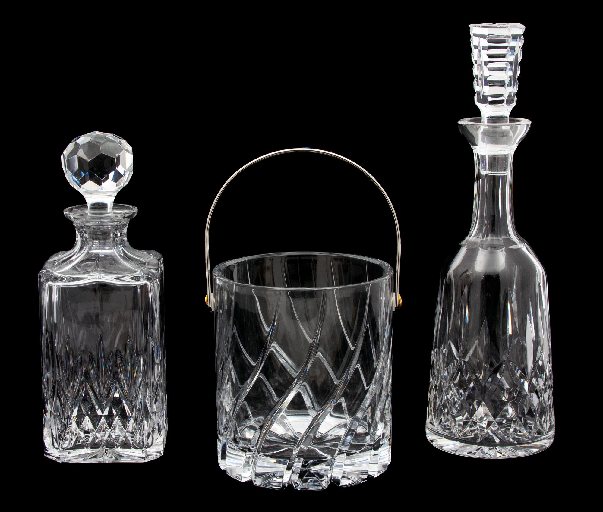 Two Cut Glass Decanters and an Ice Bucket Height of tallest 13 inches. — 20TH CENTURY