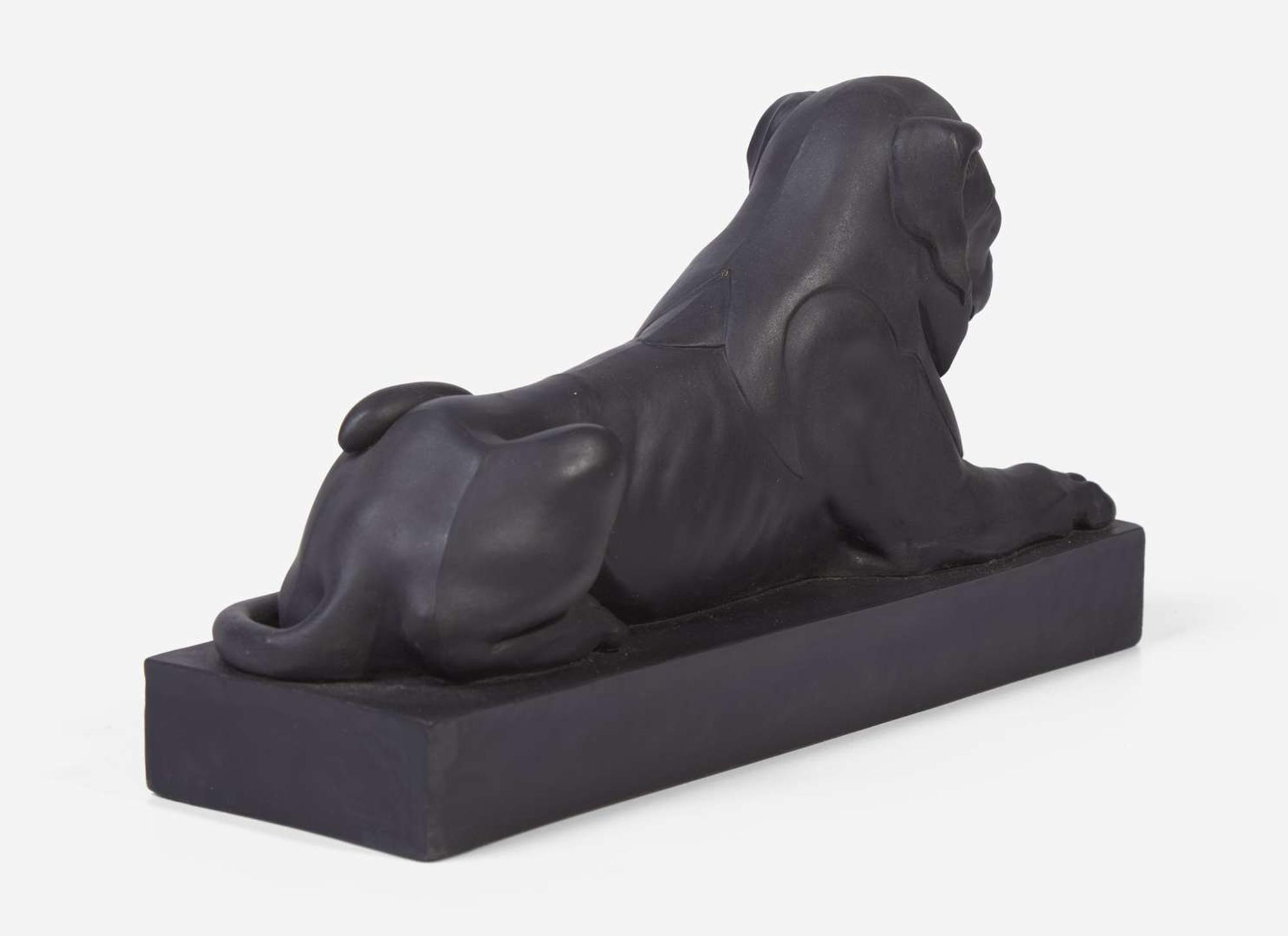 A Wedgwood Black Basalt Figure of a Lion Couchant