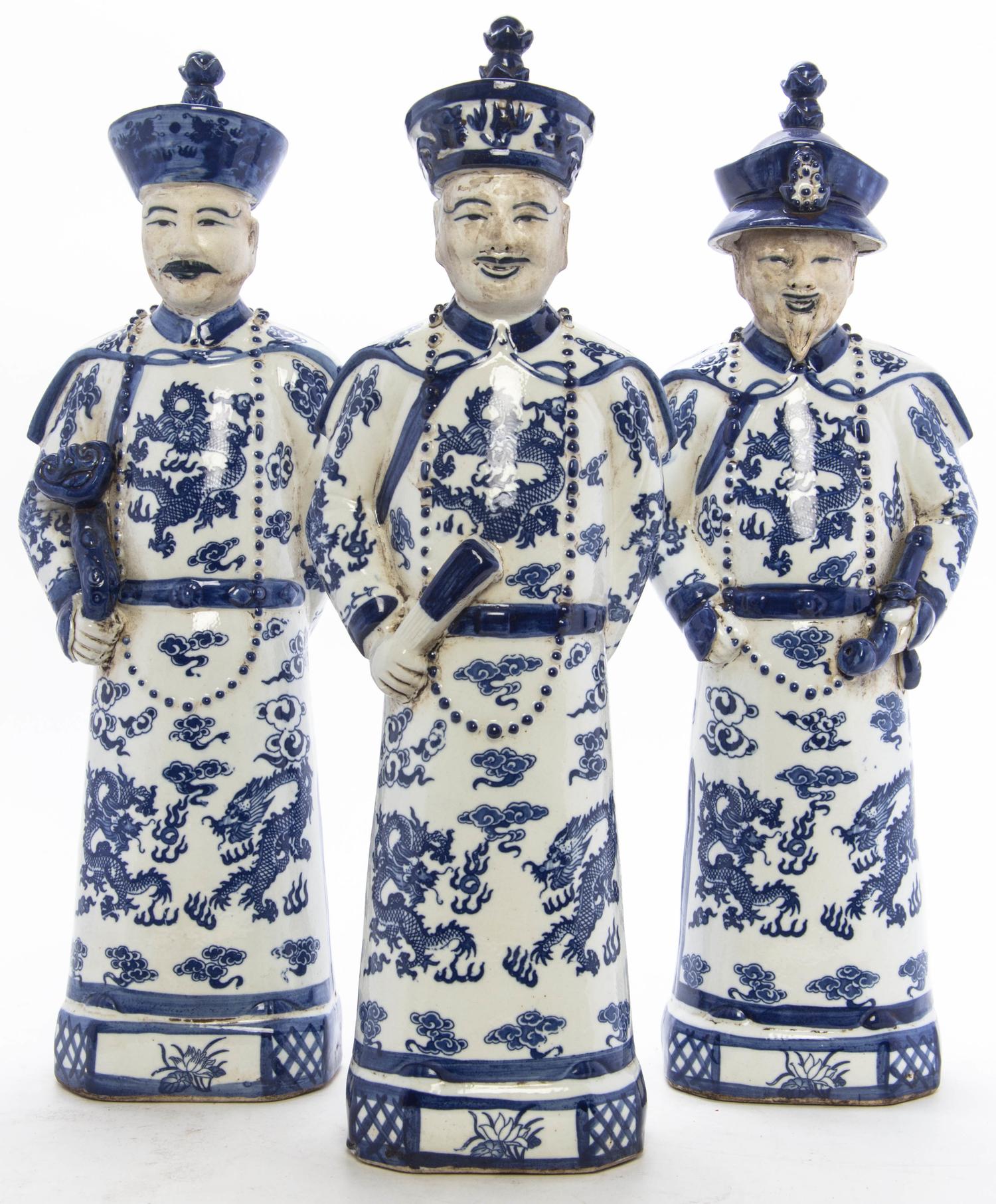 A Set of Three Chinese Glazed Ceramic Figures Height 17 1/2 inches.