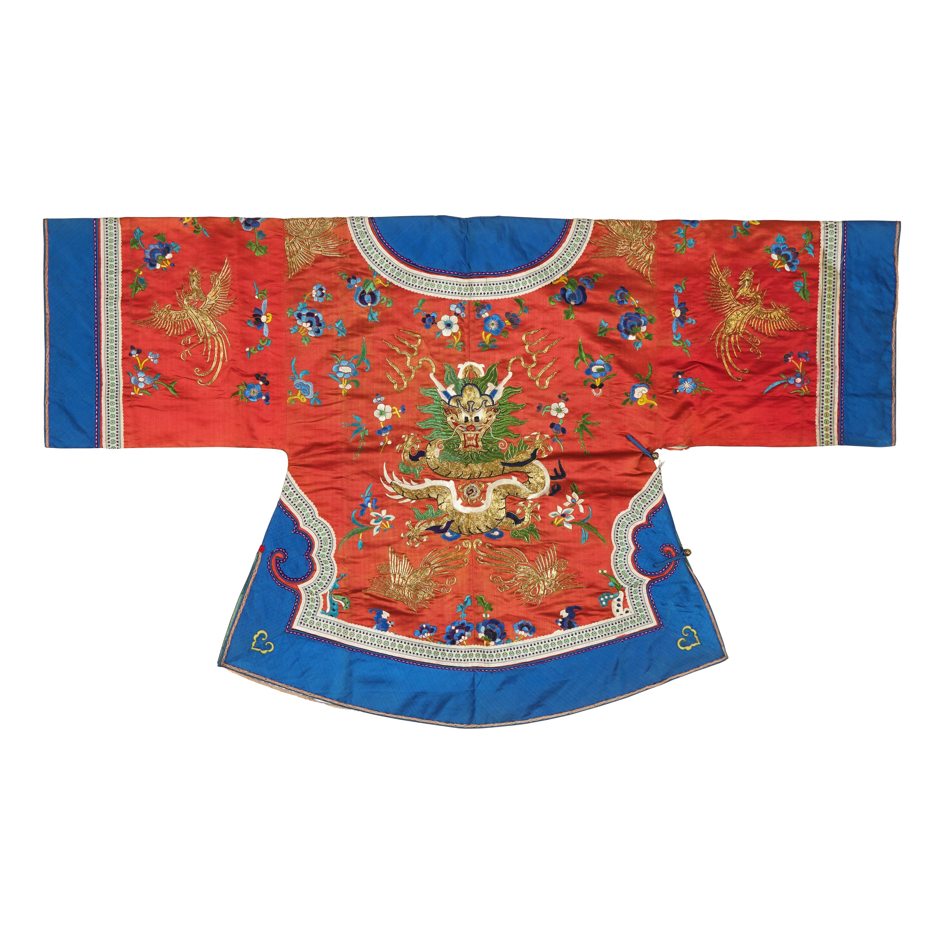 A Chinese Red Ground Silk 'Dragon' Lady's Jacket, Early 20th Century 清晚期 紅地綉龍紋女大襟