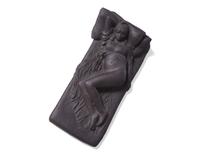 A Wedgwood Black Basalt "Girl on Bed" Figure