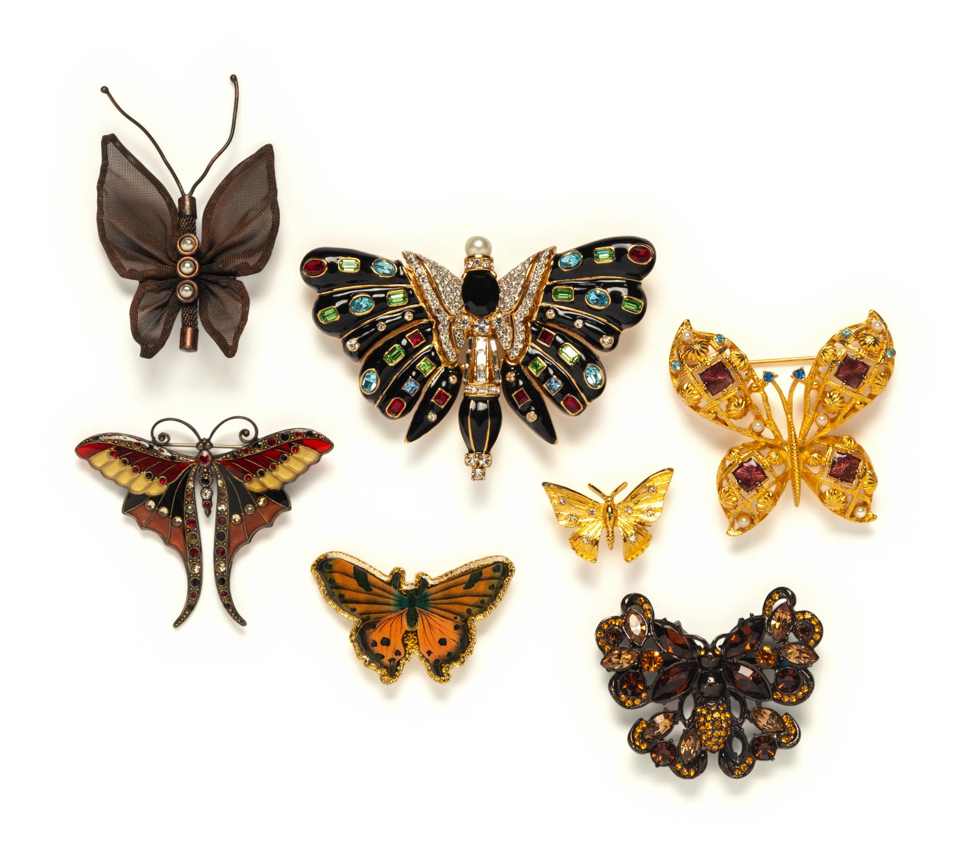 A GROUP OF SEVEN BUTTERFLY BROOCHES
