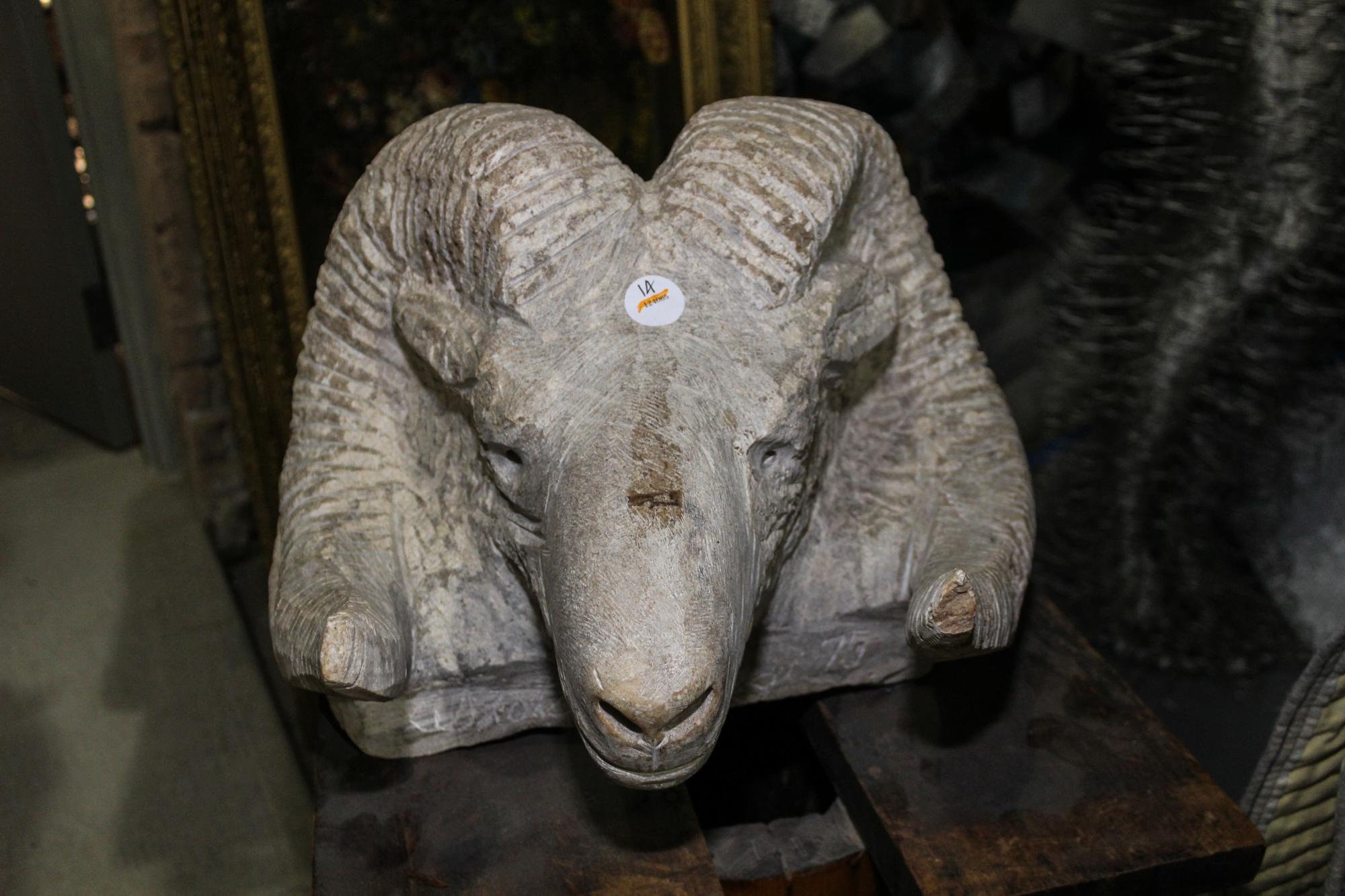 A Carved Sculpture of a Ram's Head Width 18 inches. — SECOND HALF 20TH CENTURY