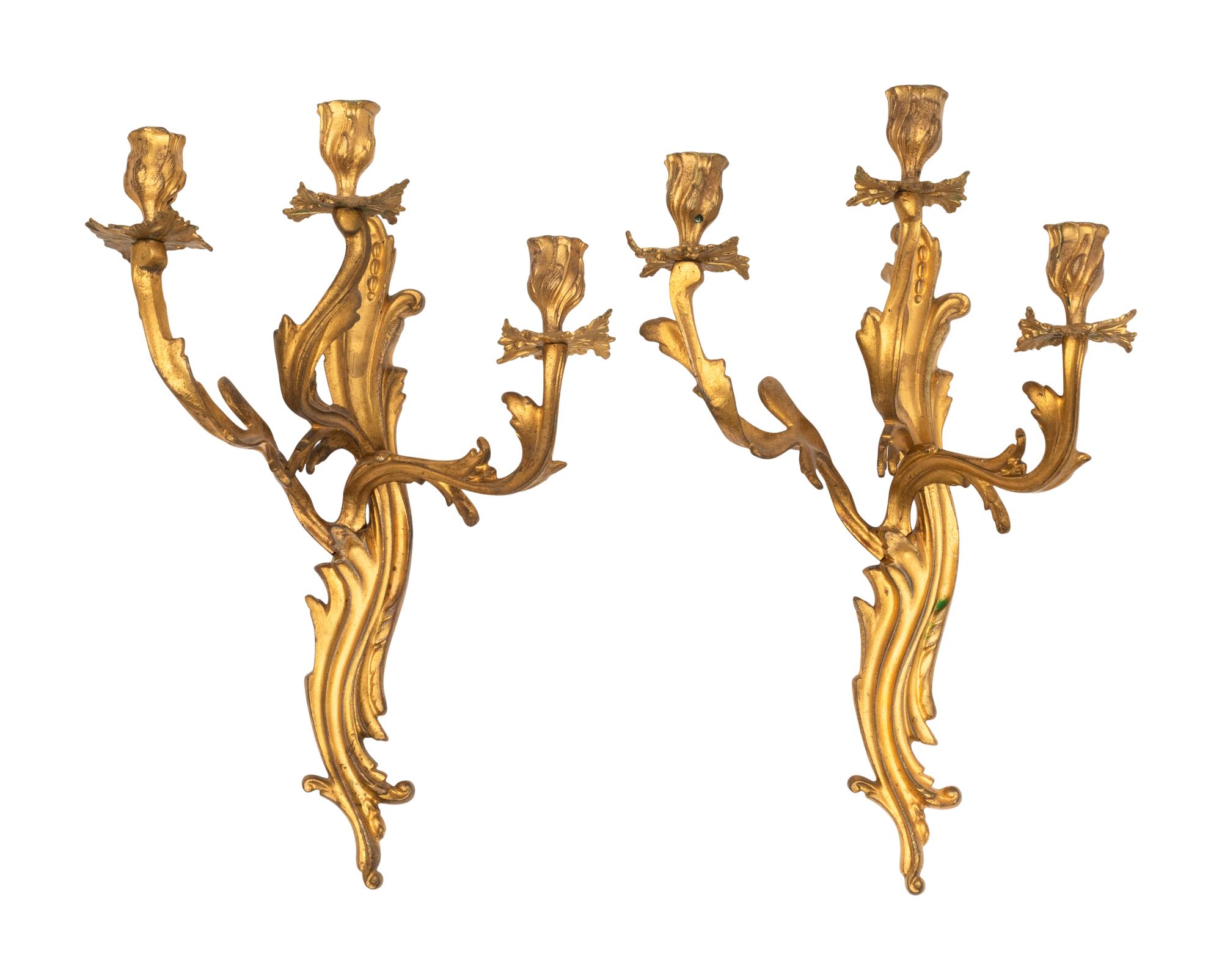 A Pair of Louis XV Style Gilt Bronze Three-Light Sconces