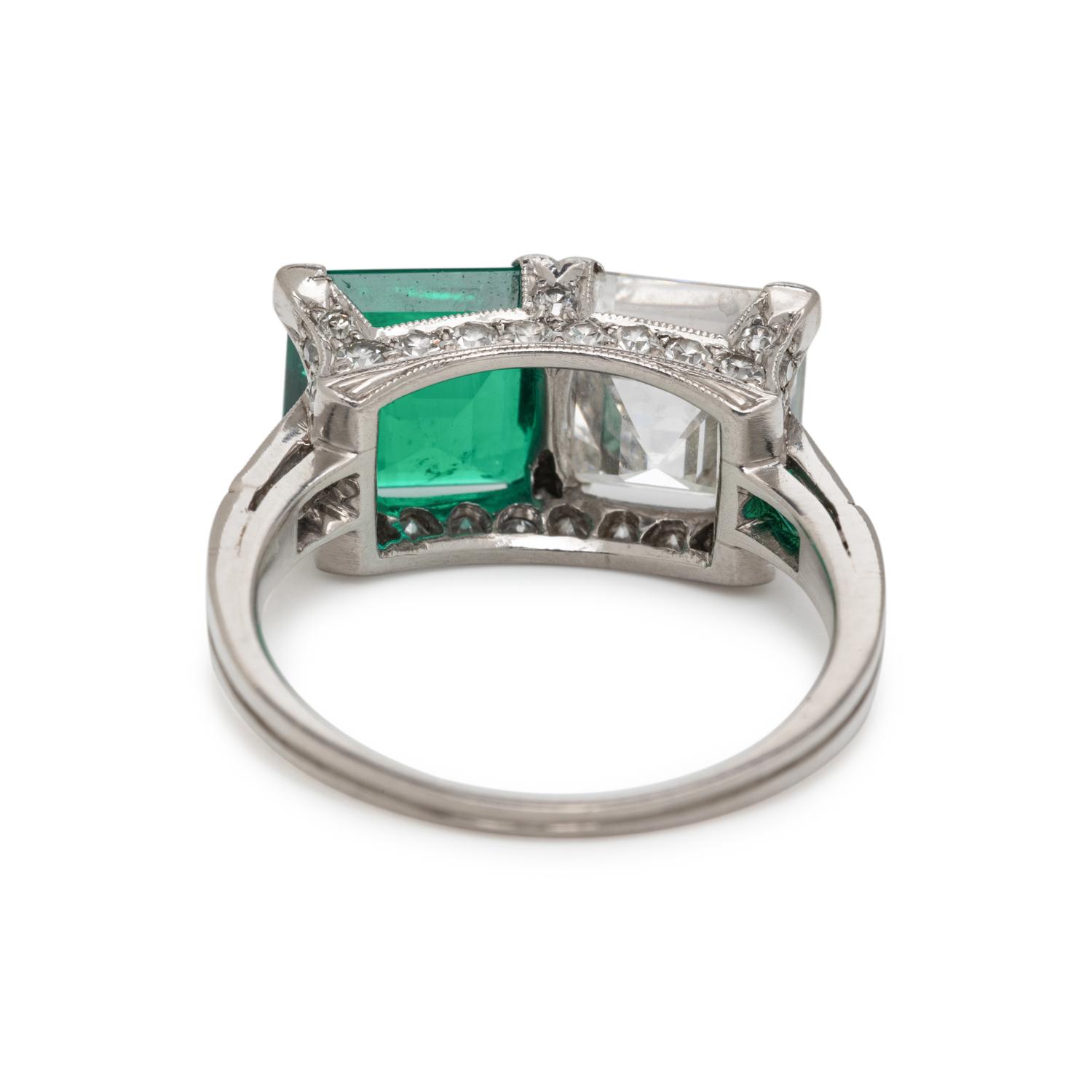 ART DECO, EMERALD AND DIAMOND 'TOI ET MOI' RING