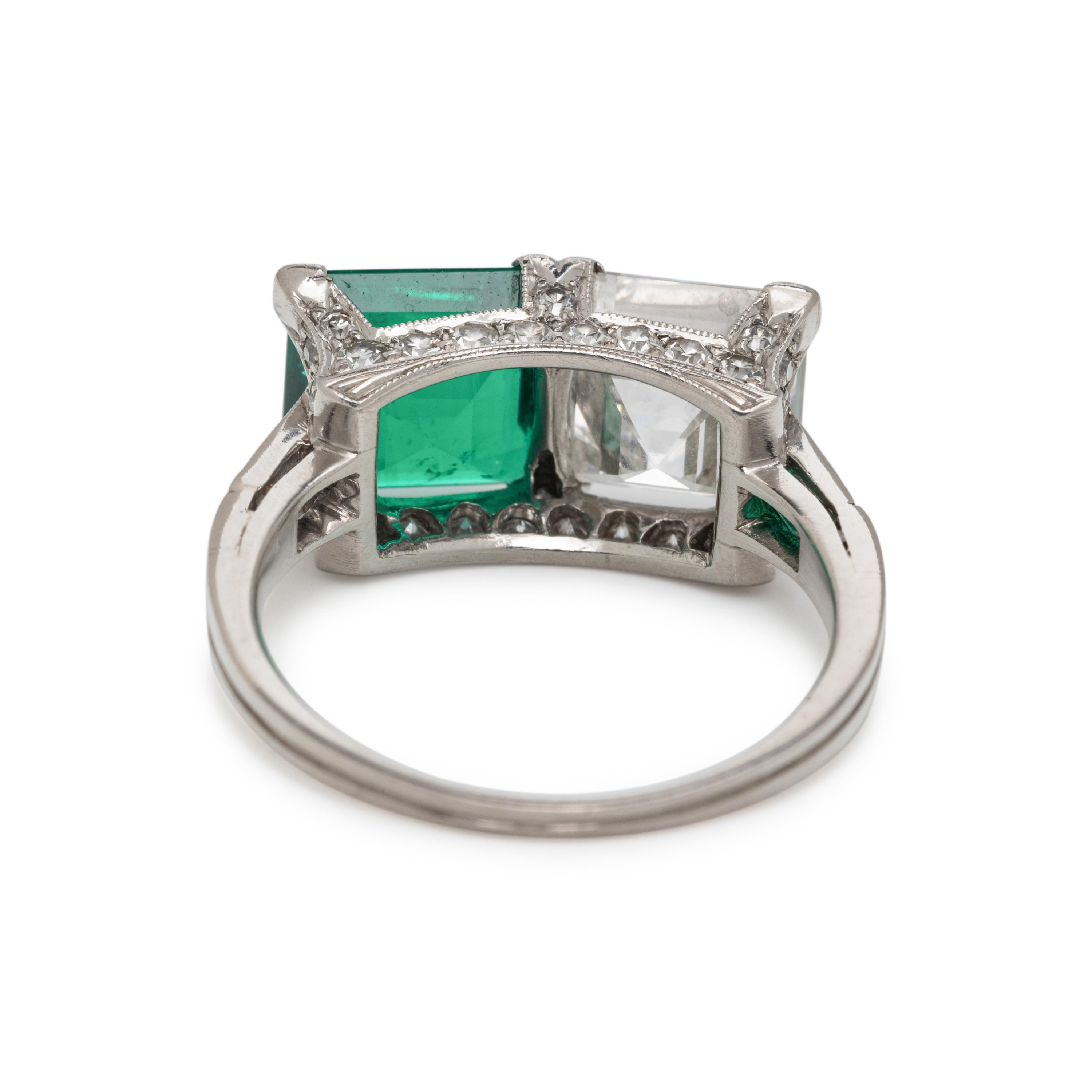 ART DECO, EMERALD AND DIAMOND 'TOI ET MOI' RING