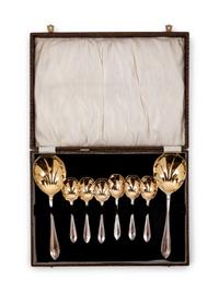 A Cased Set of Parcel Gilt SIlver-Plate Serving Spoons