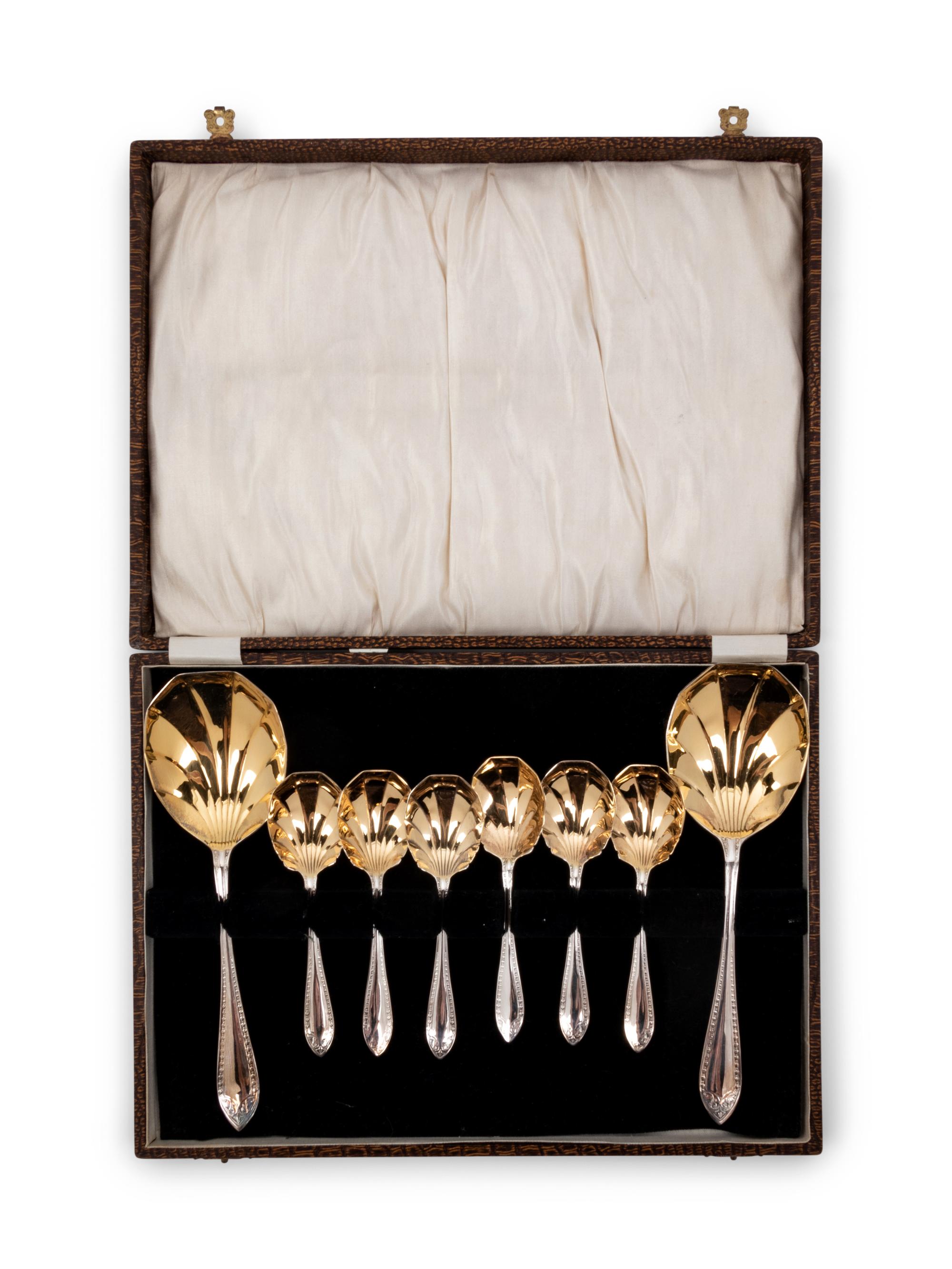 A Cased Set of Parcel Gilt SIlver-Plate Serving Spoons